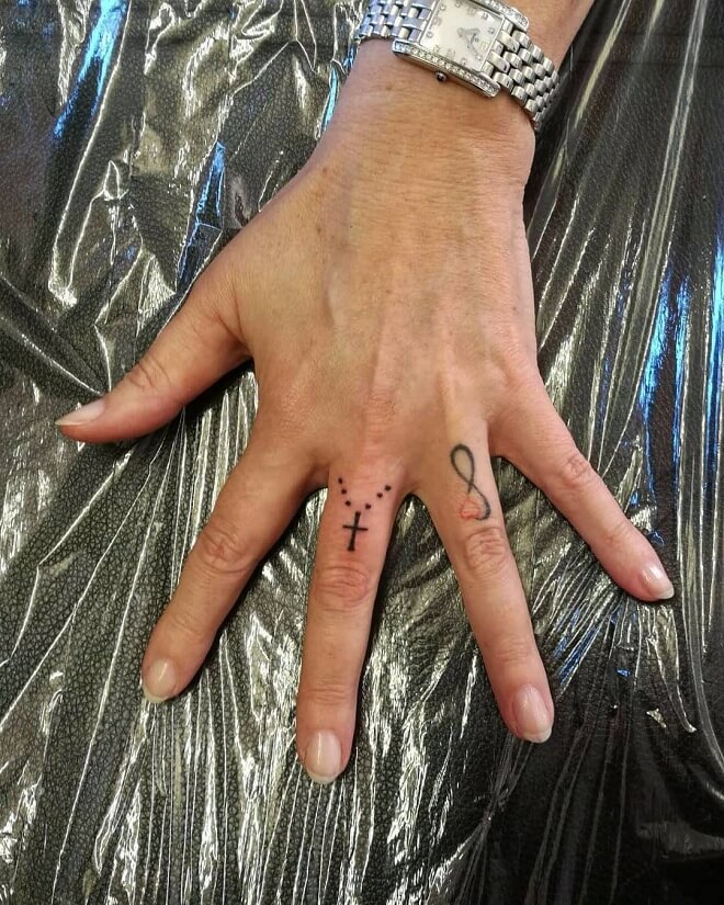 Cross Finger Tattoos