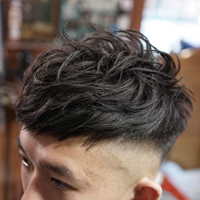 Bald Fade with Top Messy Hairstyle