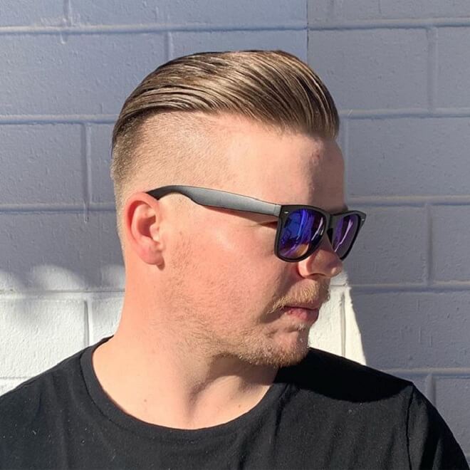 High Skin Fade with Swept Back Hair