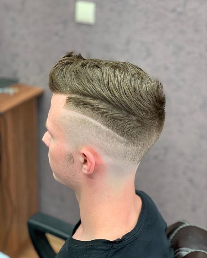 Low Skin Fade with Textured Hair On Top